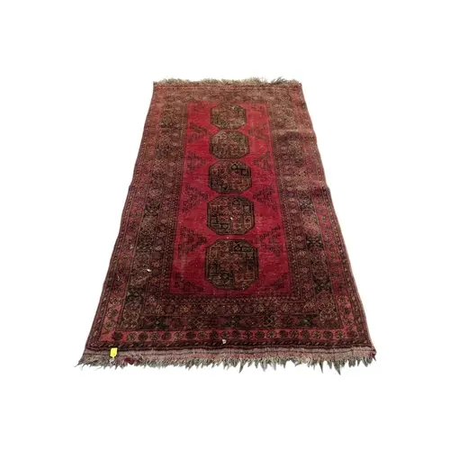 A vintage mid 20th century Persian Islamic Afghan carpet flo...