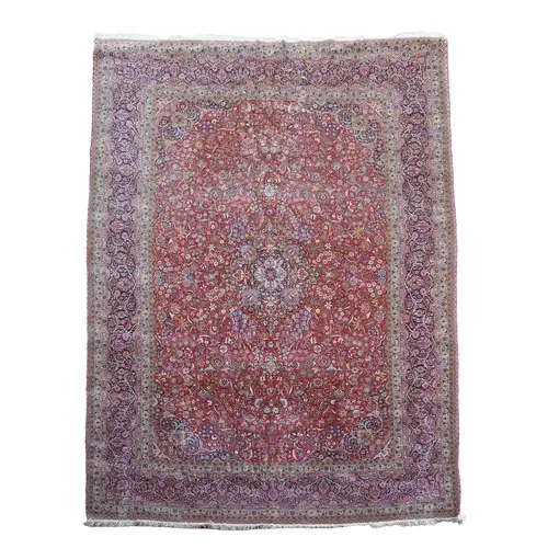 A Kashan burgundy ground carpet early 20th century, the cent...