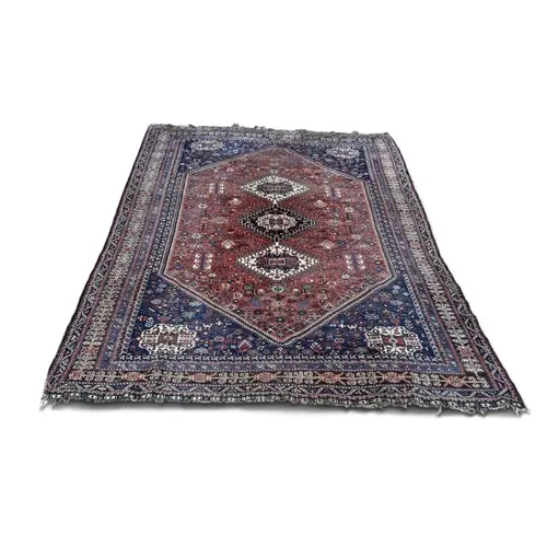 A PERSIAN CARPET 302cm x 202cm