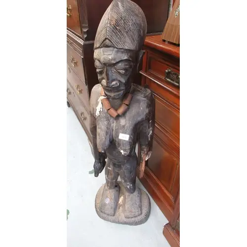 20th Century West African carved hardwood figure of a standi...