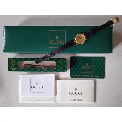 Gucci- A 1993 ladies 3400F watch having a gold plated case, ...