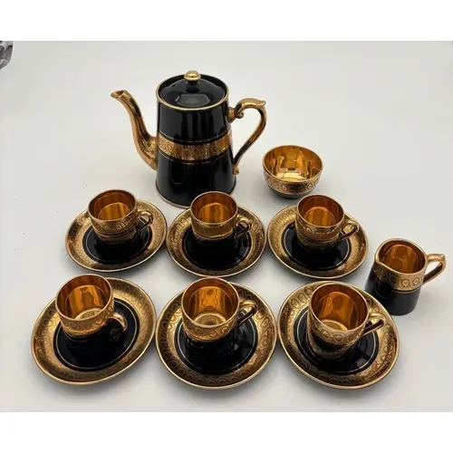 A GIBSONS AND SONS SEVRES DAVENPORT COFFEE SET