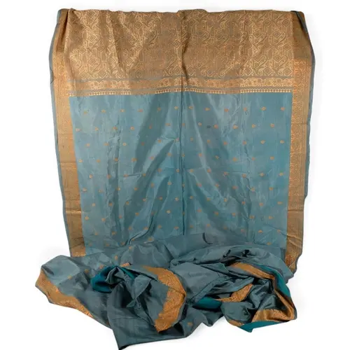 A long Indian embroidered silk Sari