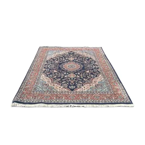 A PERSIAN CARPET 264 x 185 cm.