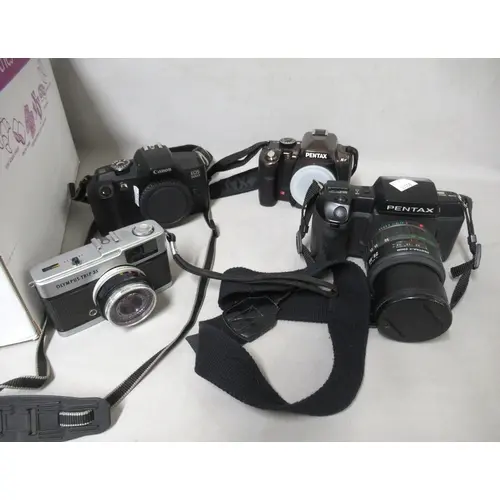Canon EOS 5000 SLR film camera, body, a Pentax SF7 SLR film ...