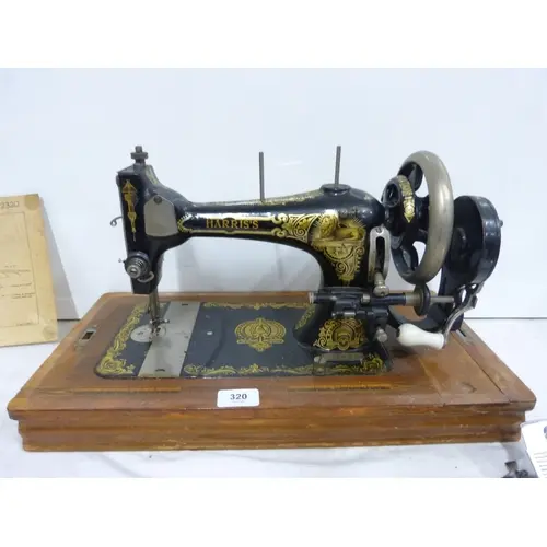 Antique Harris's German made sewing machine, cased circa 191...