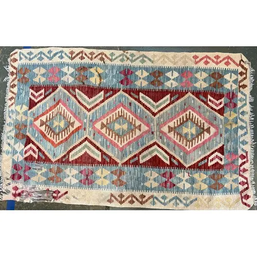 A small flatweave Kilim style rug, 141x90cm; together with a...