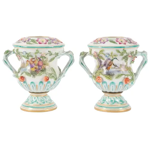 A pair of Continental porcelain campana urns, late 19th / ea...