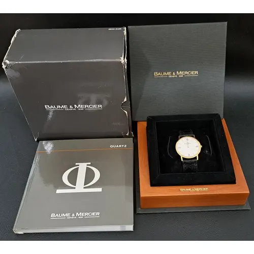 BOXED BAUME & MERCIER EIGHTEEN CARAT GOLD CASED CLASSIMA MV0...