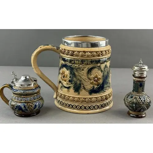 Ceramics: Doulton Lambeth- a silver rimmed tankard, decorate...