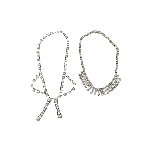 Two Art Deco white metal and paste cluster set necklaces, i...