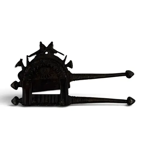 A 19TH CENTURY OR EARLIER BETEL CRUSHER 20cm x 10cm...
