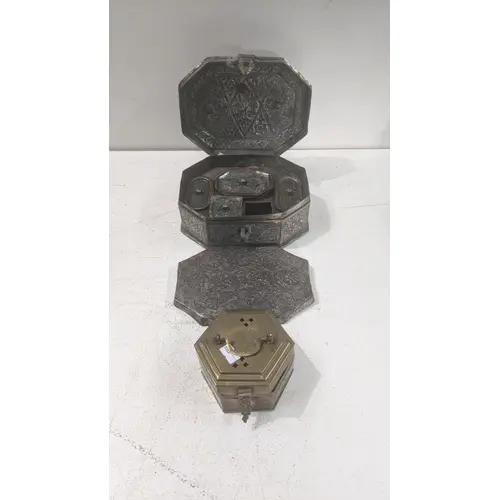 A vintage Middle Eastern copper paan daan or spice tin, havi...