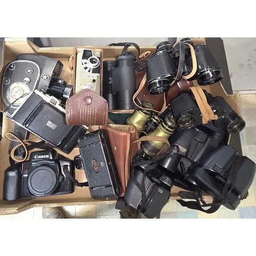 A Canon EOS 100 camera body, various binoculars including tw...
