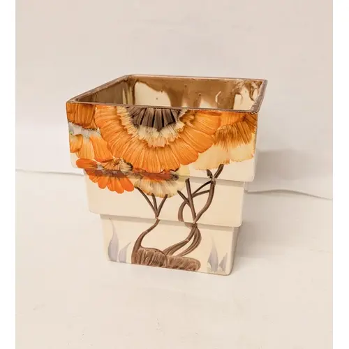 A Clarice Cliff Art Deco square urn pot, decorated in the Rh...