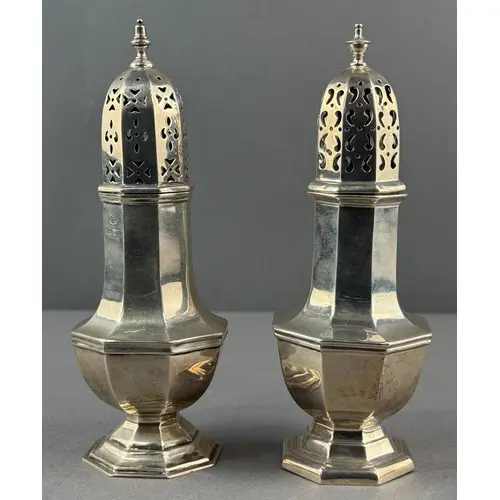 Silver: a sugar caster of octagonal baluster form by Wilson ...