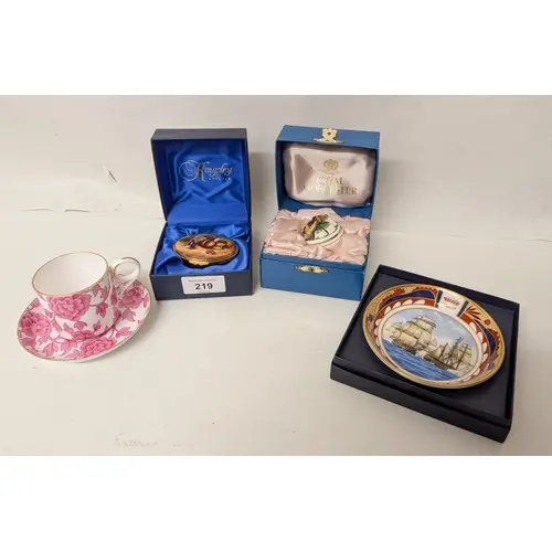 A Royal Crown Derby puce floral decorated cabinet cup and sa...