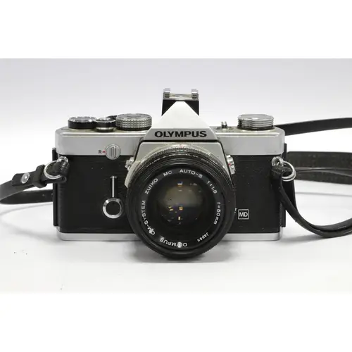 Olympus OM-1N MD 35mm SLR Film Camera with attached Zuiko MC...