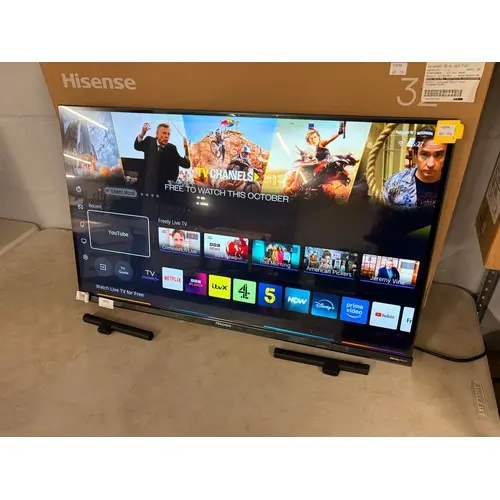 A Hisense 32" QLED smart Television with remote and stand, o...