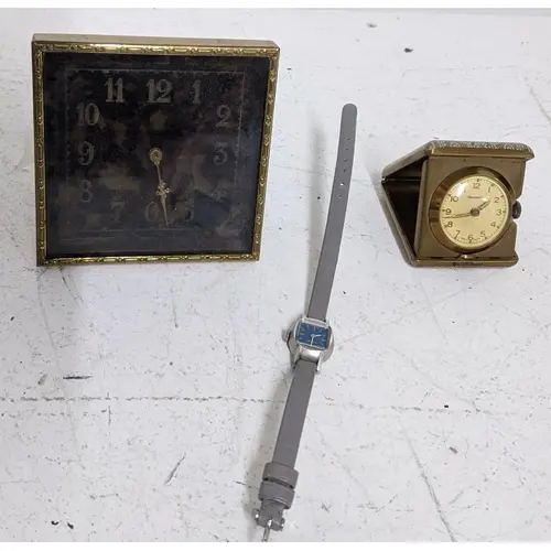 A gilt brass framed dressing table strut clock with faux tor...
