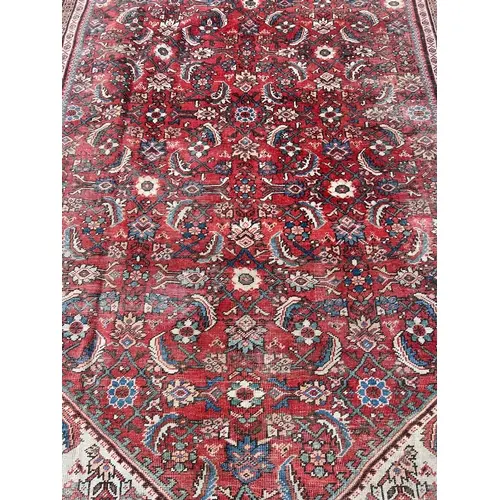 A PERSIAN MUGHAL RUG 387cm x 270cm