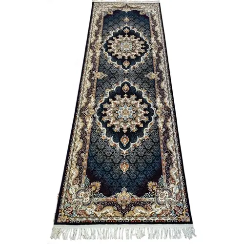 A deep pile Iranian Runner with blue ground and a central me...