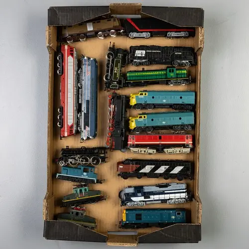 Fruit tray containing 00 gauge steam locos and diesels. To i...