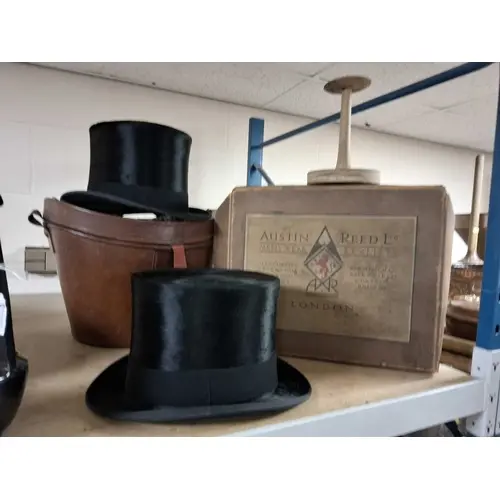 TWO SILK PLUSH TOPS, HATS, AND BOXES both have the defining ...