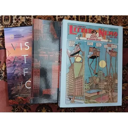 Nine boxes of assorted mainly hardback books including ficti...