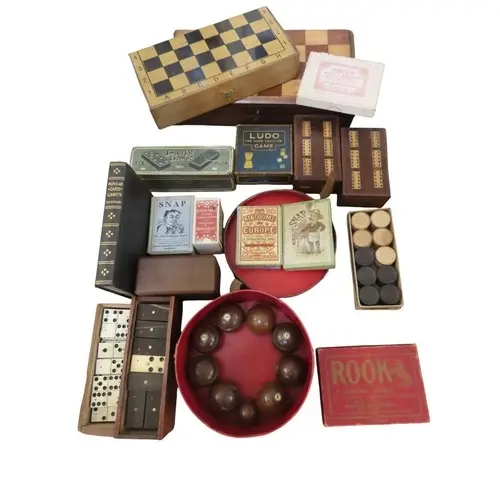 A quantity of vintage toys including timber carpet bowls, do...
