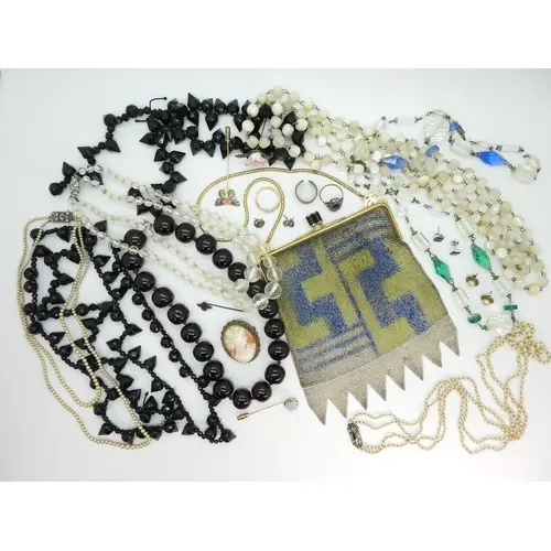 An Art Deco mesh purse, a Caithness Glass topped lapel pin, ...