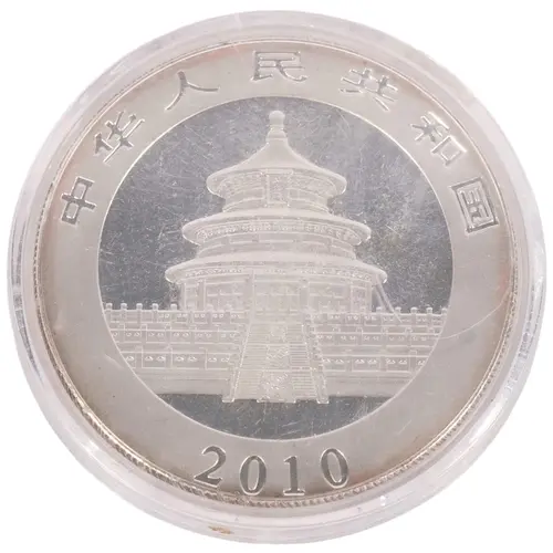 A 2010 Chinese 1oz 999 silver 10 yuan panda coin, in protect...