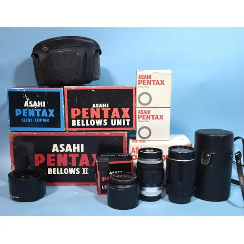 An Asahi Takumar f3.5/135 lens, a Super-Takuma f3.5/135 lens...
