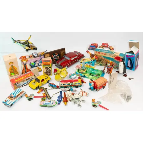 Toys: a Victorian mechanical kaleidoscope lantern slide; a t...