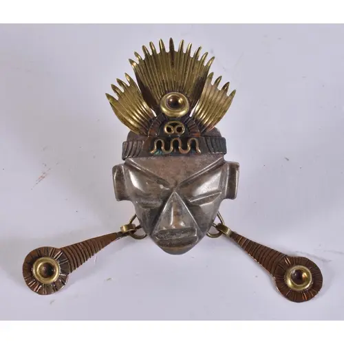 A VINTAGE MEXICAN CARVED STONE YELLOW METAL AND COPPER TRIBA...