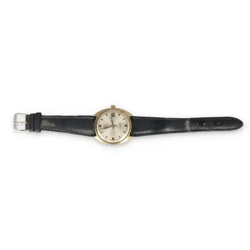AN OMEGA GENTLEMAN'S SEAMASTER COSMIC With leather strap...