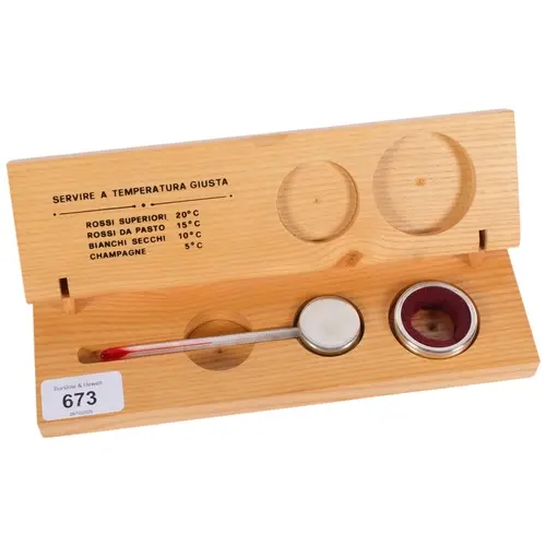 A cased and silver-mounted wine thermometer