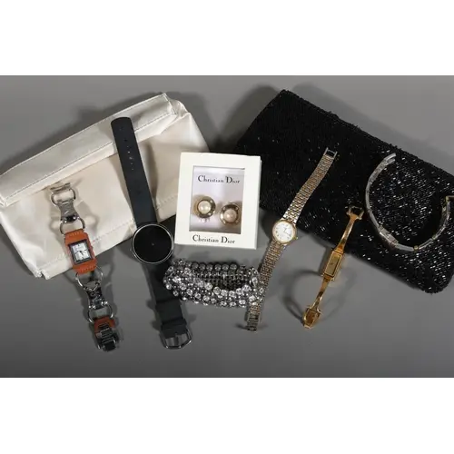 Pair of earring held in Christian Dior box, Michael Kors wri...