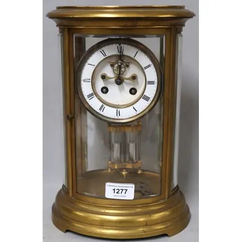 Late 19th Century oval gilt brass four glass library clock, ...