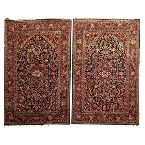 A pair of antique Ispahan blue rugs, early 20th century, the...