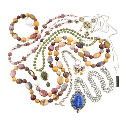 A collection of silver jewellery. Seven items to include: a ...
