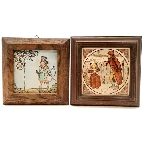 Antique tile of children behind a fence t/w hand painted til...