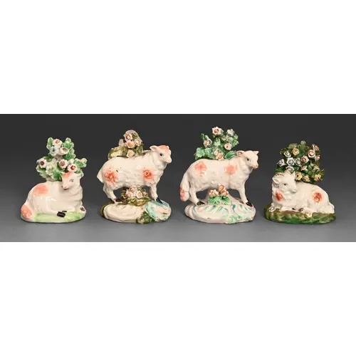 Four Derby models of sheep, c1780, before bocage, recumbent ...