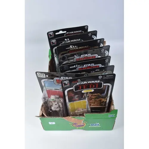 TWELVE CARDED AND SEALED HASBRO KENNER STAR WARS THE BLACK S...