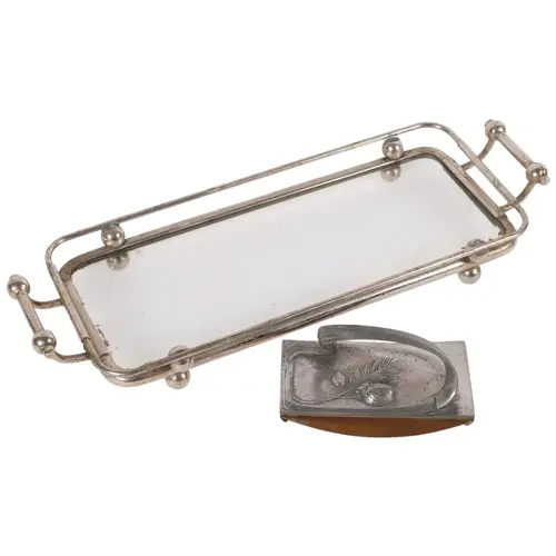 An Art Nouveau silver plated glass based and galleried twin-...