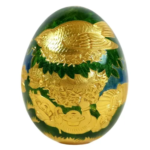 A 22CT GOLD 'CONUNDRUM' EGG. 'Cuckoo Cuckoo', the eleventh e...