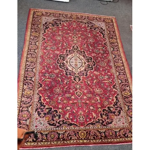 Fine handwoven rich Red ground Persian Mashad carpet traditi...