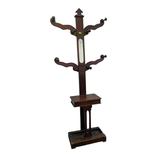 A vintage mid century mahogany hall stand. Having a small gl...