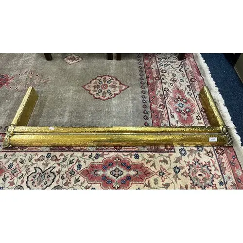 Brass art nouveau style fender, 117cm wide.