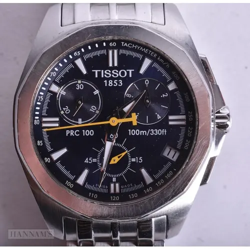 A TISSOT WRIST WATCH. Running. 4 cm wide.